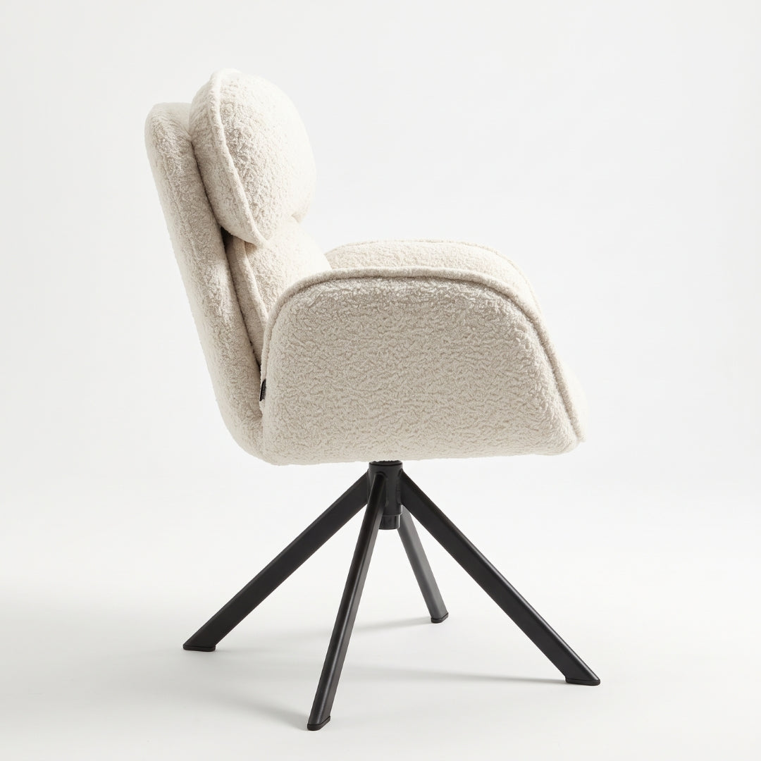 Silla giratoria bouclé crema con cabecera – vista lateral